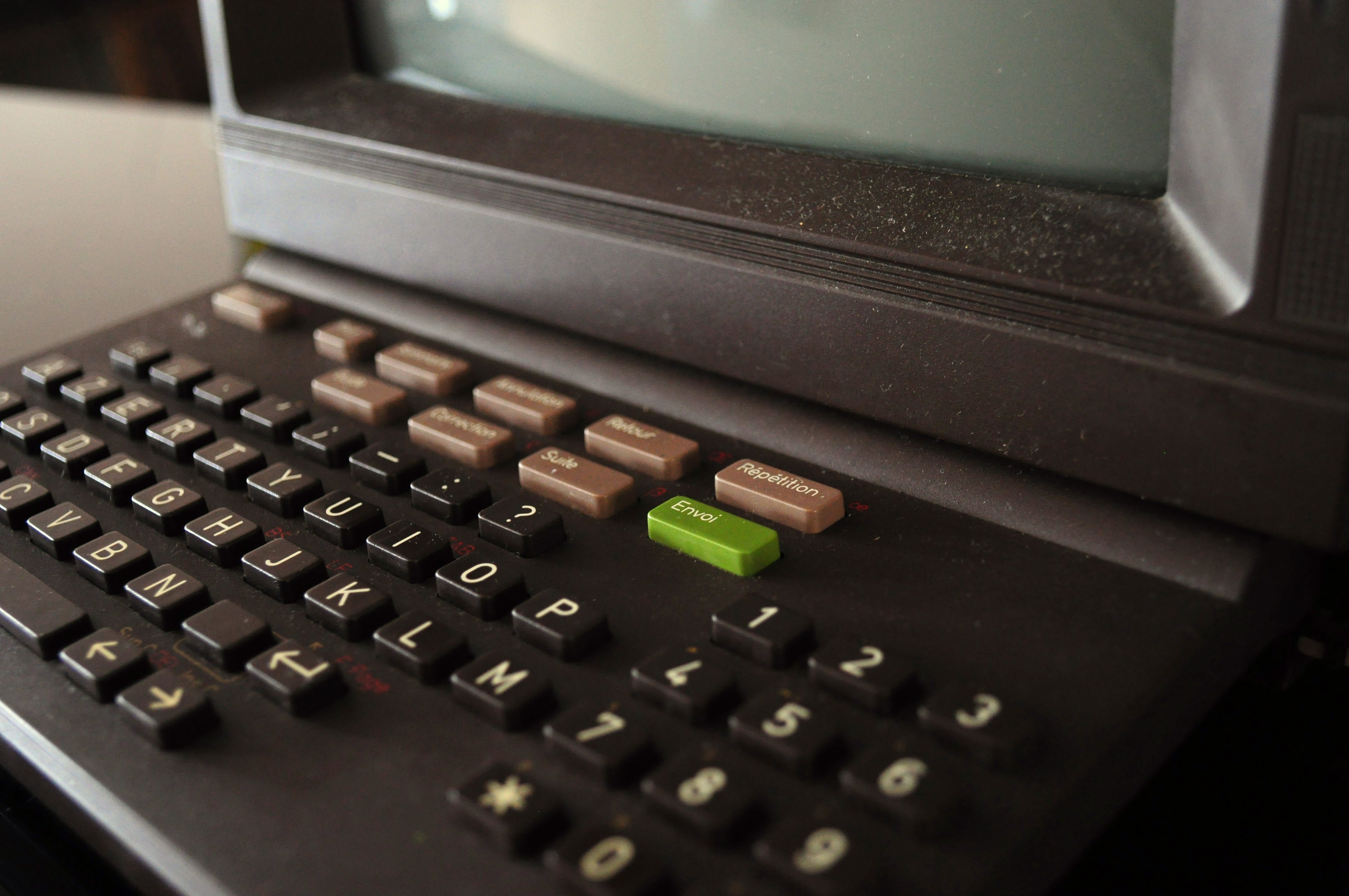 a close up of a black coloured minitels keyboard.